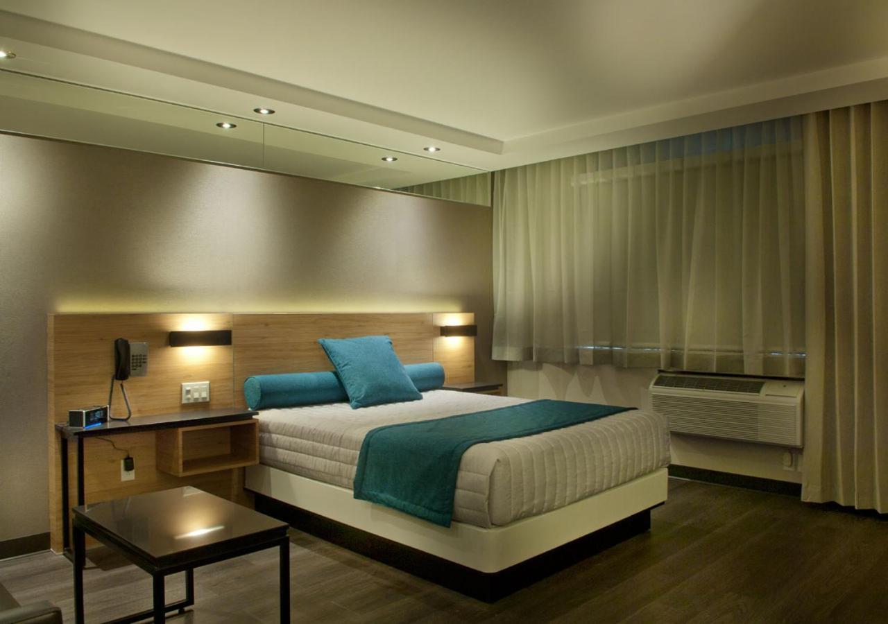 Ramada By Wyndham Laval Hotel Exterior photo