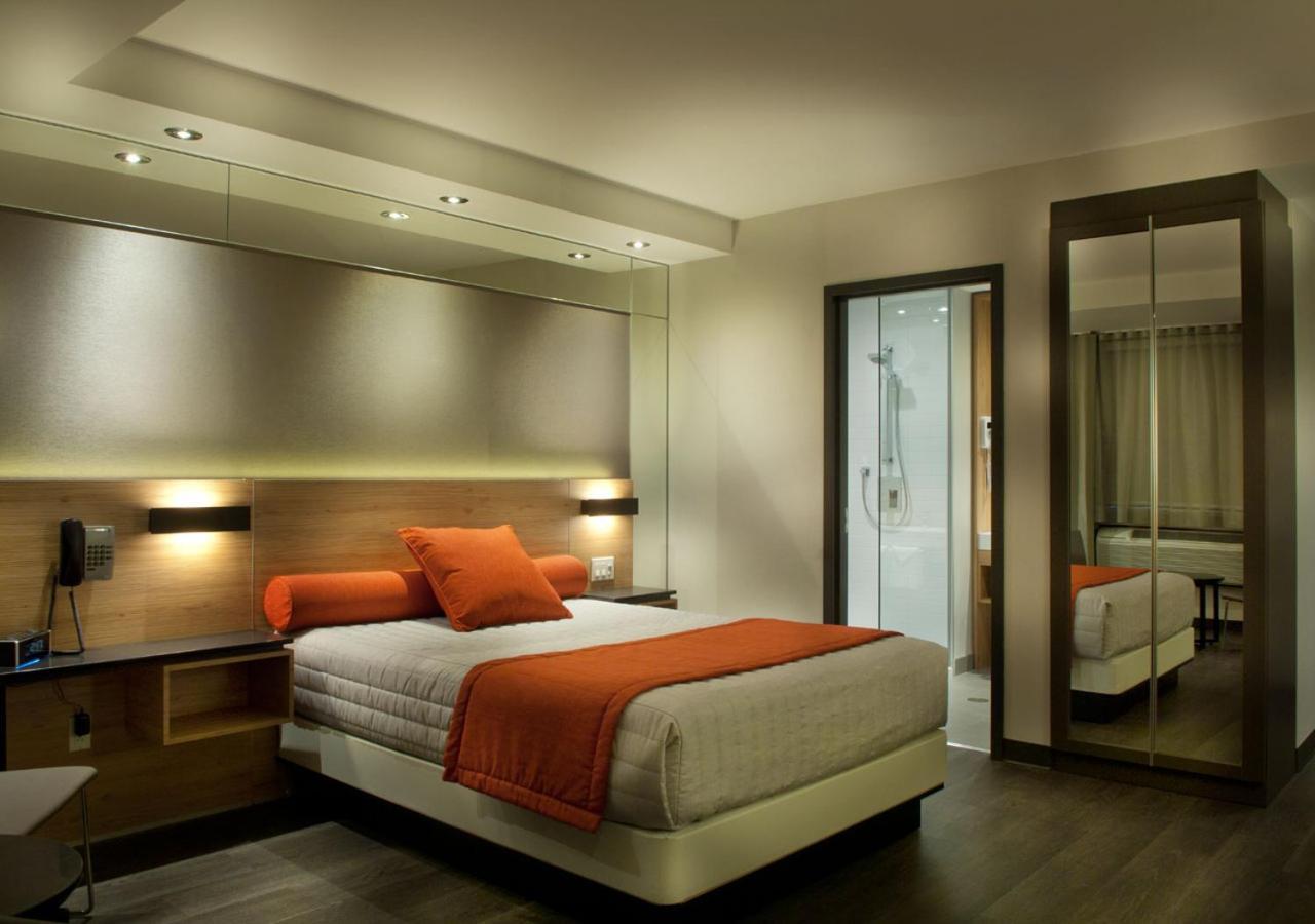 Ramada By Wyndham Laval Hotel Exterior photo