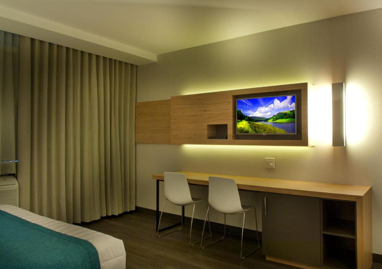 Ramada By Wyndham Laval Hotel Exterior photo